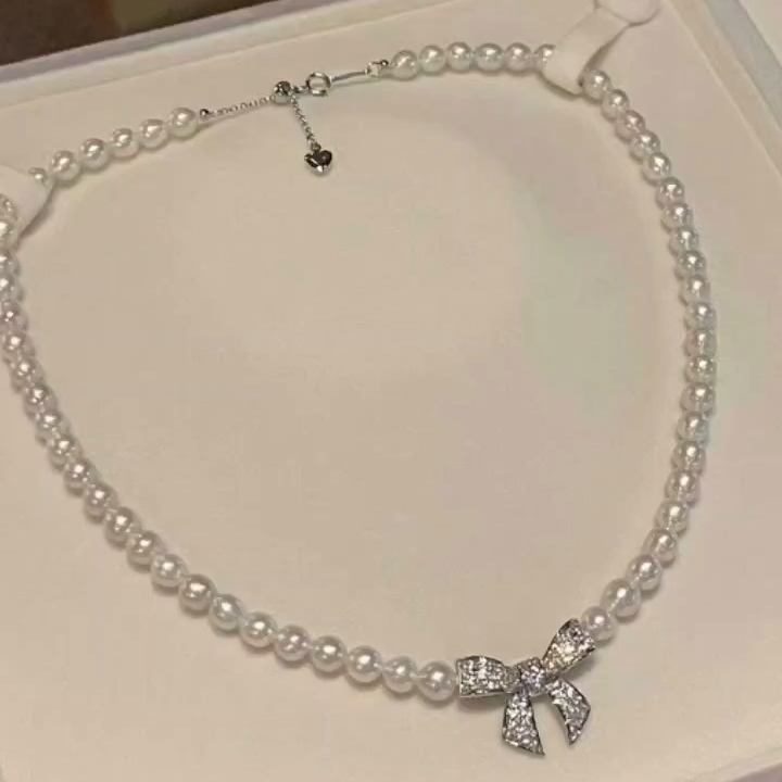 蝴蝶结珍珠项链和手链套装