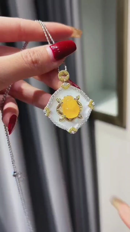 旋转龙黄玉吊坠